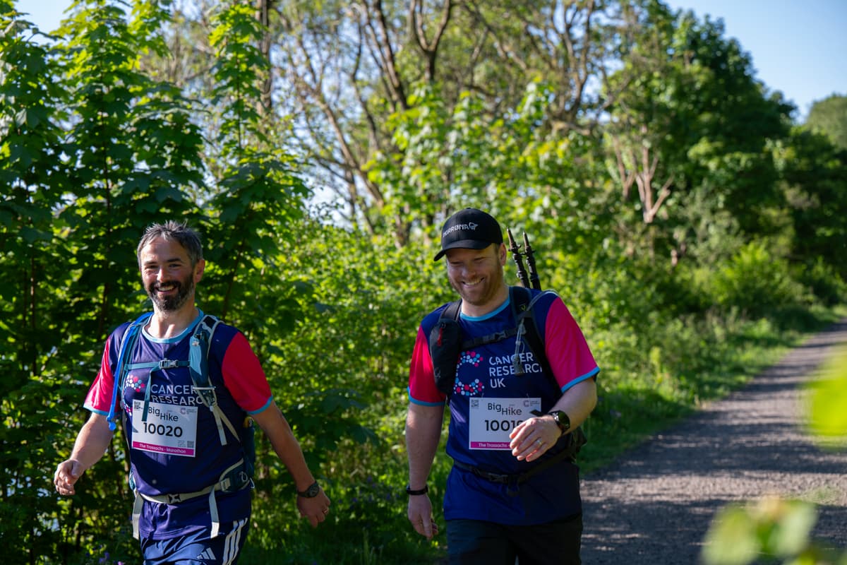 Two hikers walking along a Big Hike trail.
