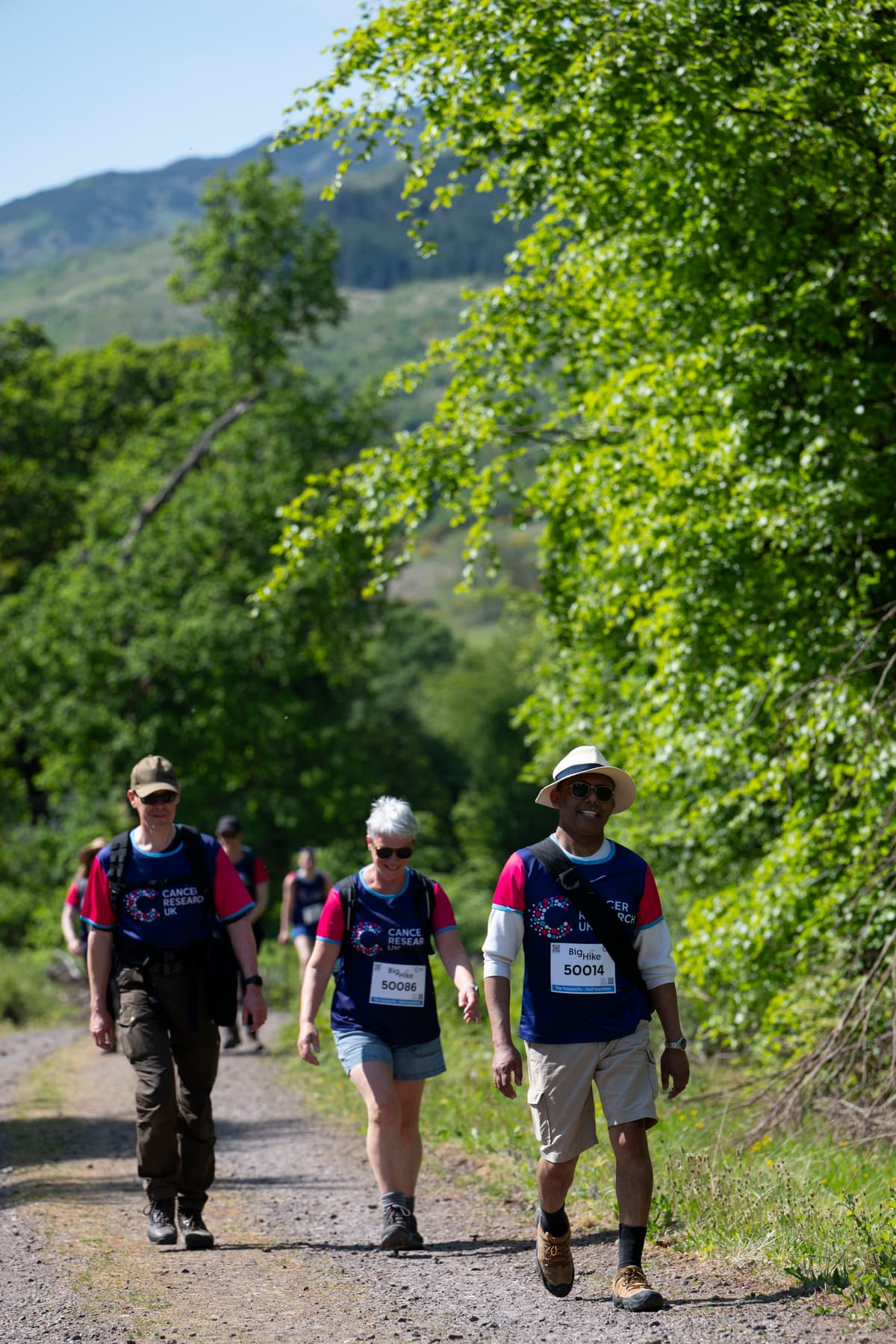 A group of hikers walking along the trail.