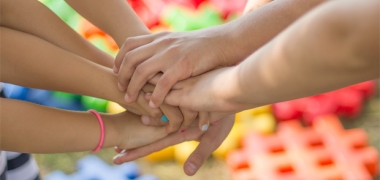 Hands together in a circle