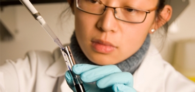 A scientist with a test tube