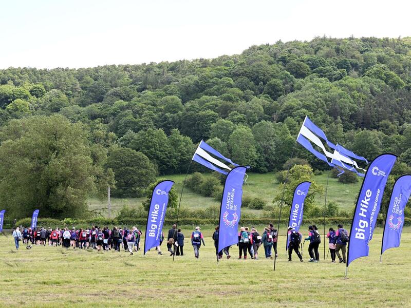 hikers walking through the start area