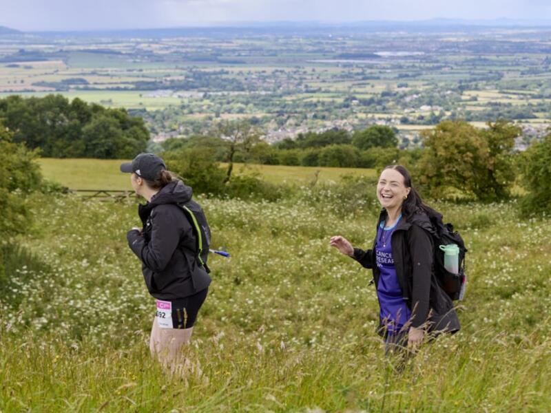 2 girls smiling in the countryside