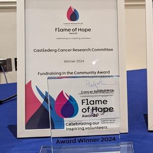 Flame of Hope certificate and trophy