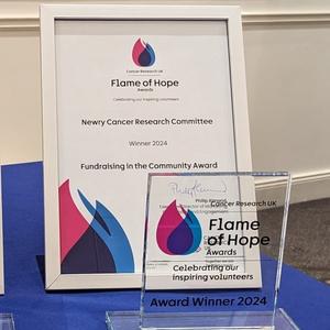 Flame of Hope certificate and trophy