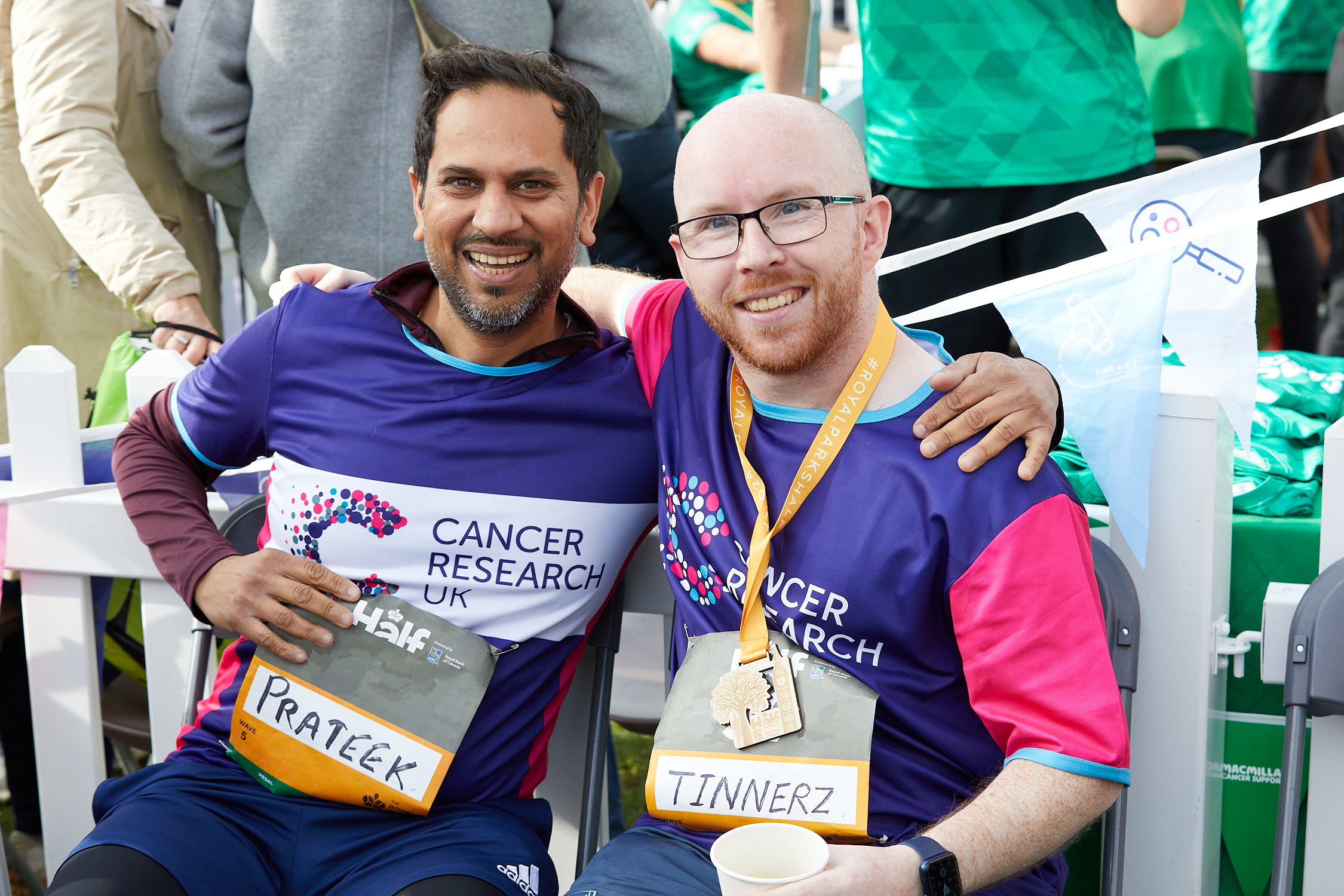 CRUK runner giving a high five