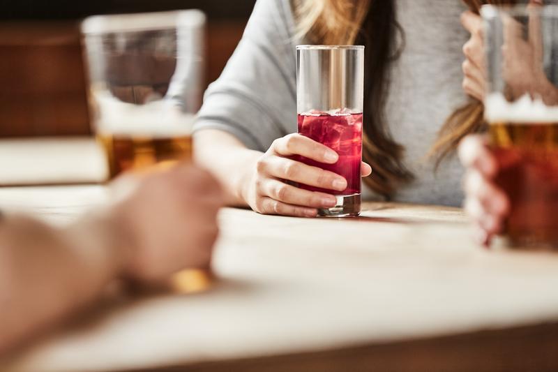 A mixture of alcoholic and non-alcoholic drinks on a table