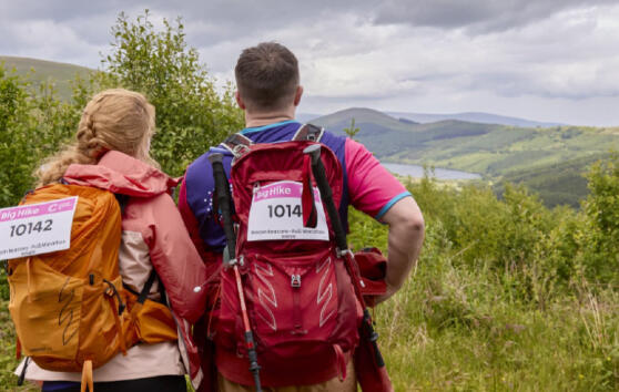 2 Big Hikers looking at incredible views of Bannau Brycheiniog