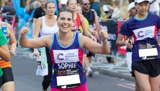 CRUK supporter smiling at an event