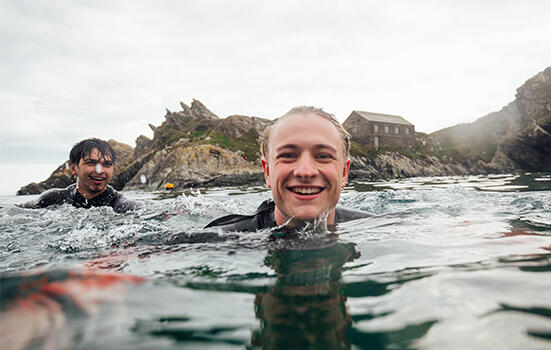 Man swimming smiling