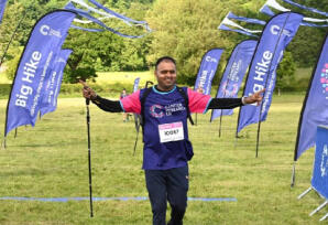 Man crossing the Big Hike finish line