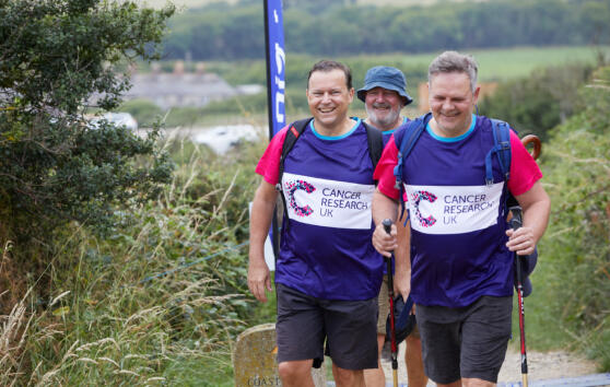 Three men hiking in the countryside for Big Hike