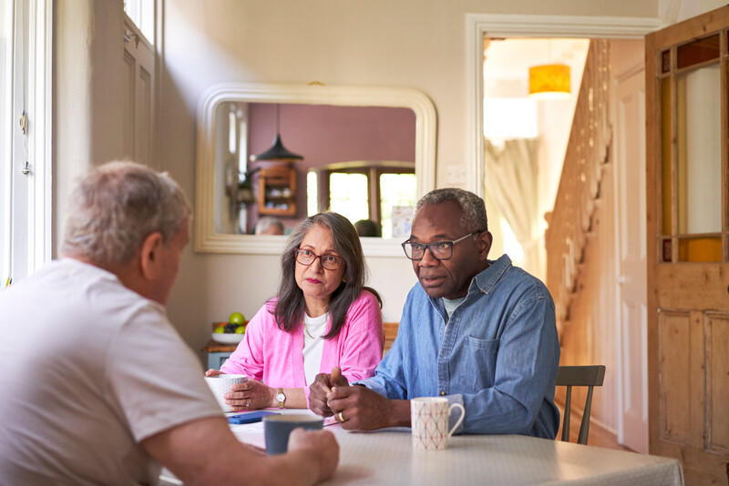 People talking around a table