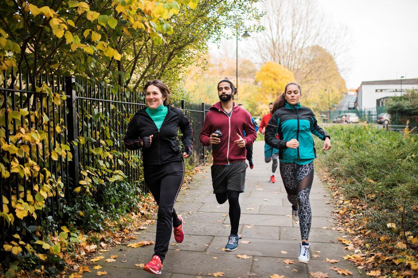 Picture of three people running