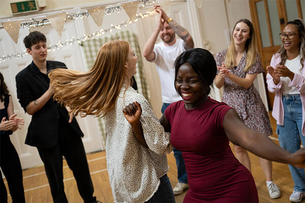 Two women dancing