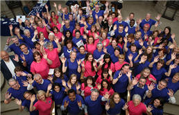 Group of waving campaigns ambassadors.