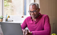 man using laptop