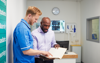 nurse and consultant talking to eachother