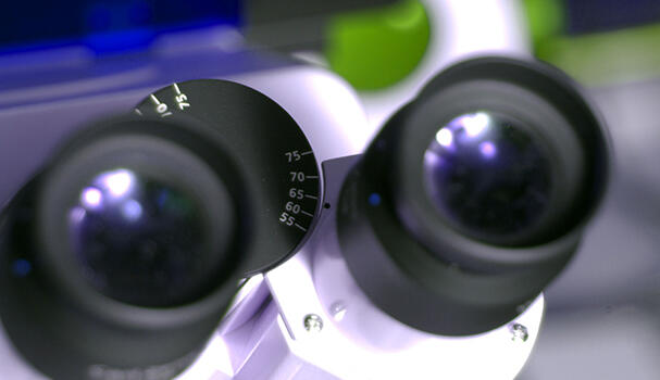 a close up image of a microscope