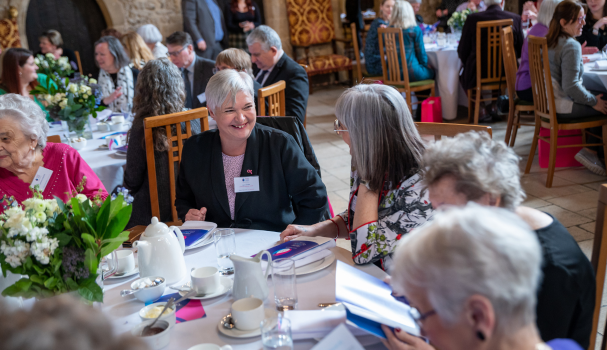 People sitting round a table at an awards ceremony