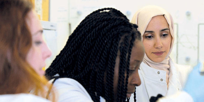 Mariam Jamal Hanjani working with colleagues