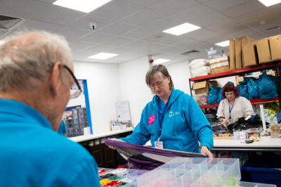 Volunteers in a shop