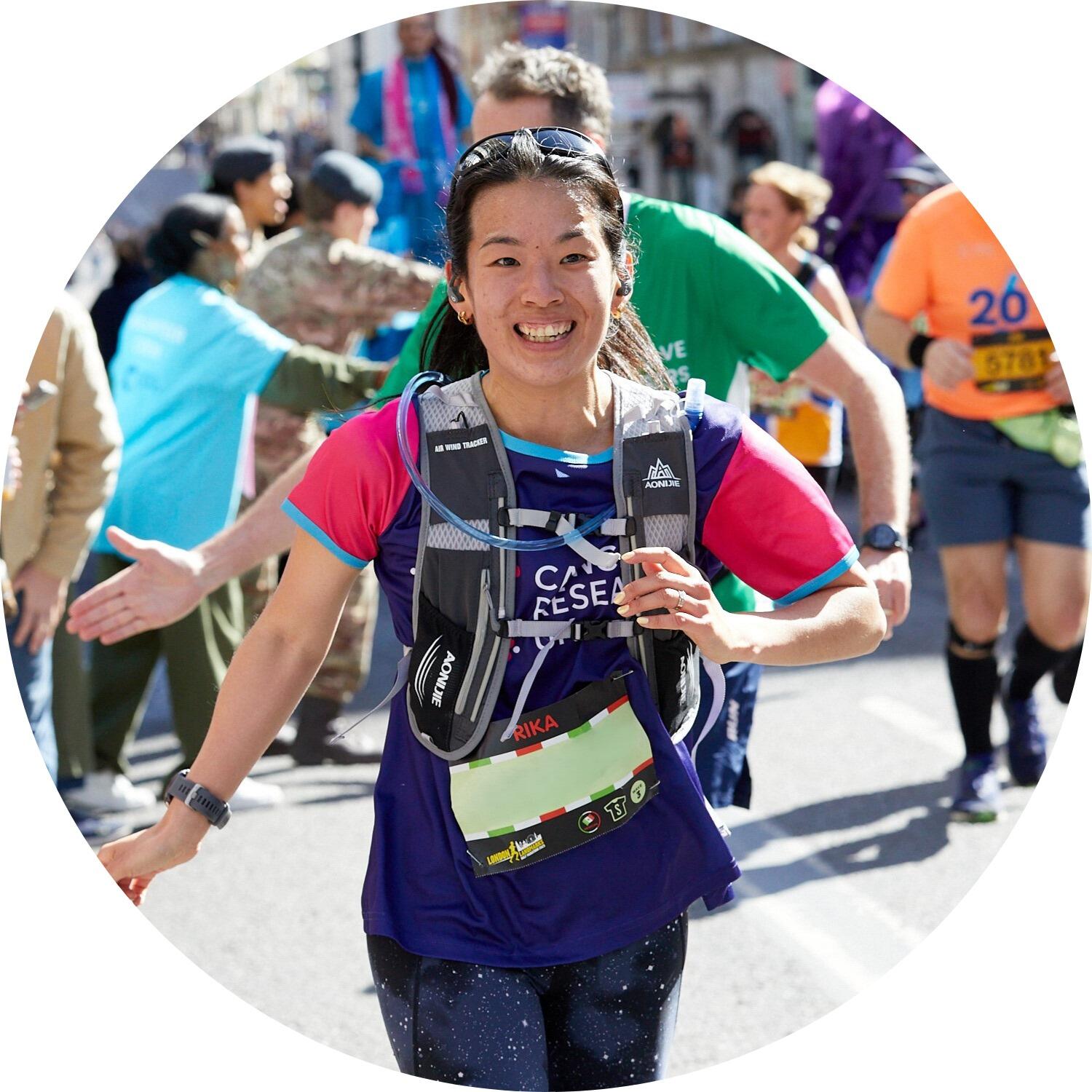 Rika smiling after high diving her daughter at London Landmarks Half Marathon