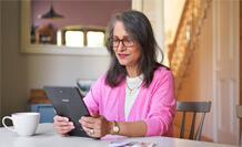 woman reading tablet